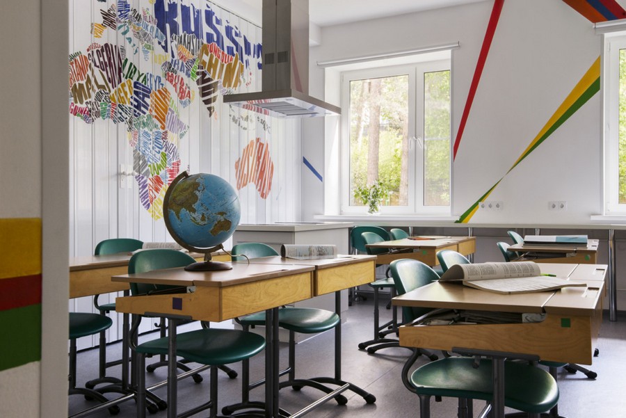 4-multifunctional-creative-beautiful-school-laboratory-interior-design-home-economics-geography-classes-world-map-bright-multi-colored-folding-doors-desks-globe-kitchen-island-cooker-hood.jpeg